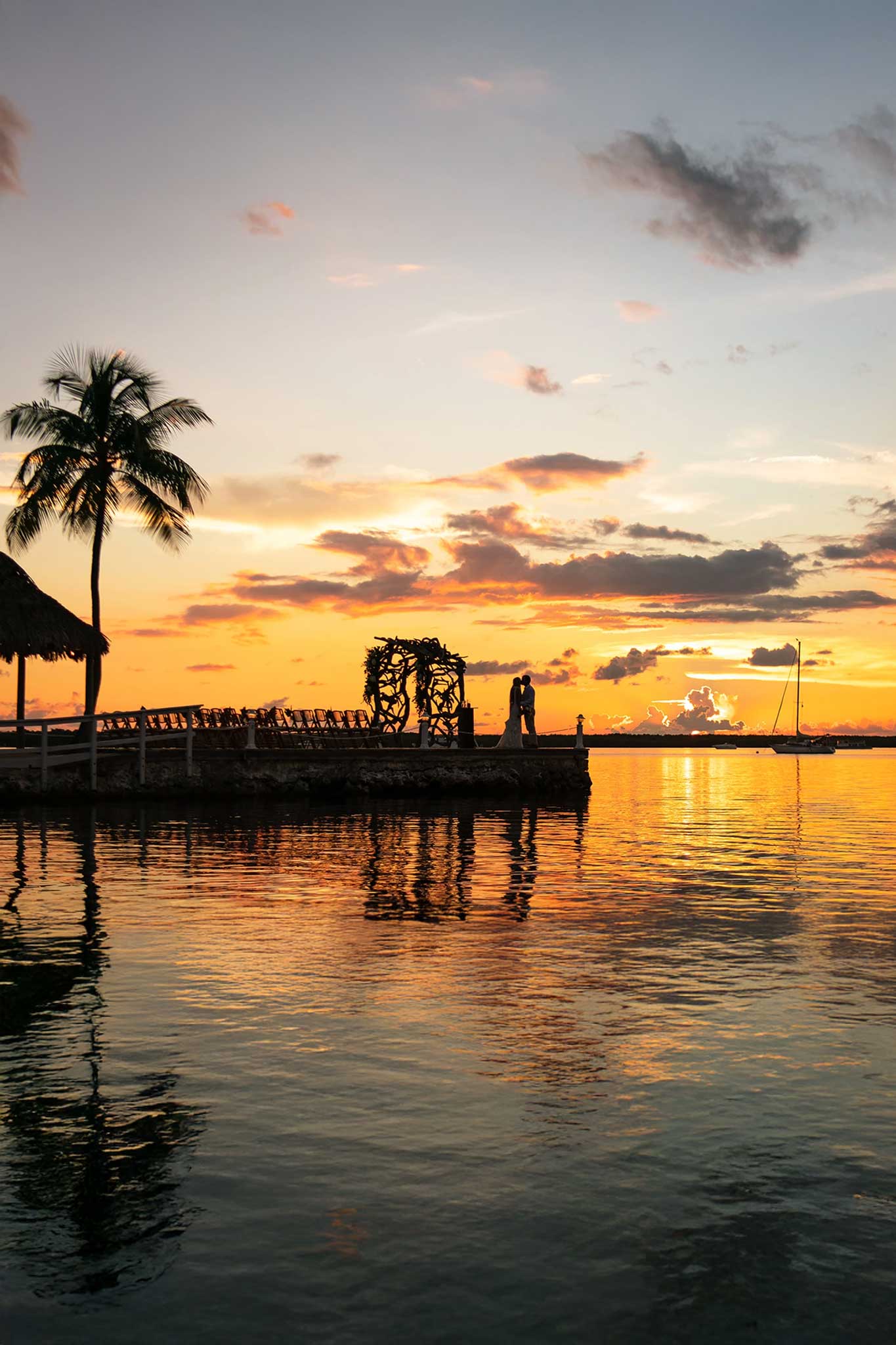 wedding couple during sunset at Largo Resort overlooking Gulf of america