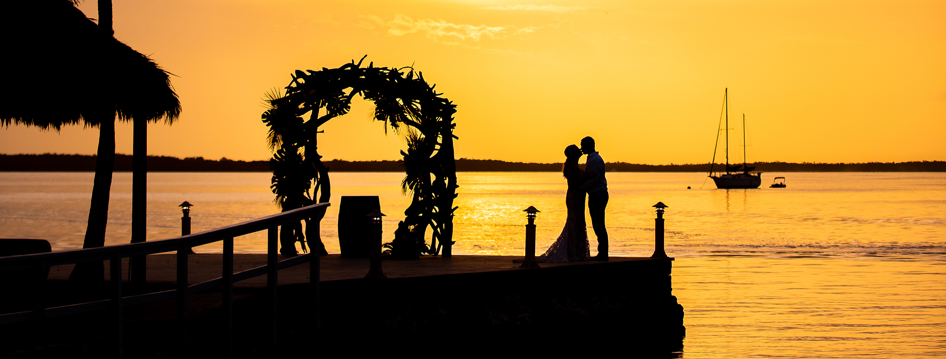 Couple at sunset on the waterfront at Largo Resort