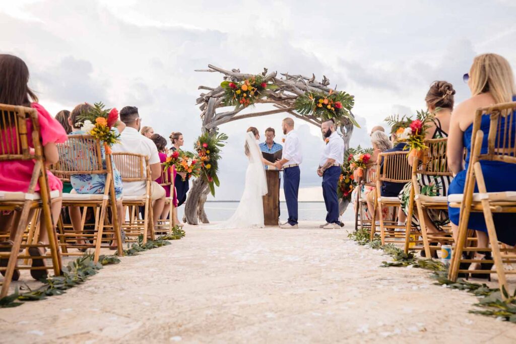 Wedding ceremony on a pier overlooking the ocean