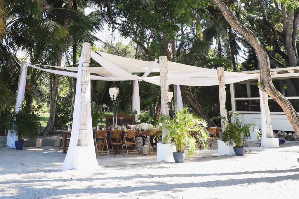 Wedding reception table under a canopy at Largo Resort